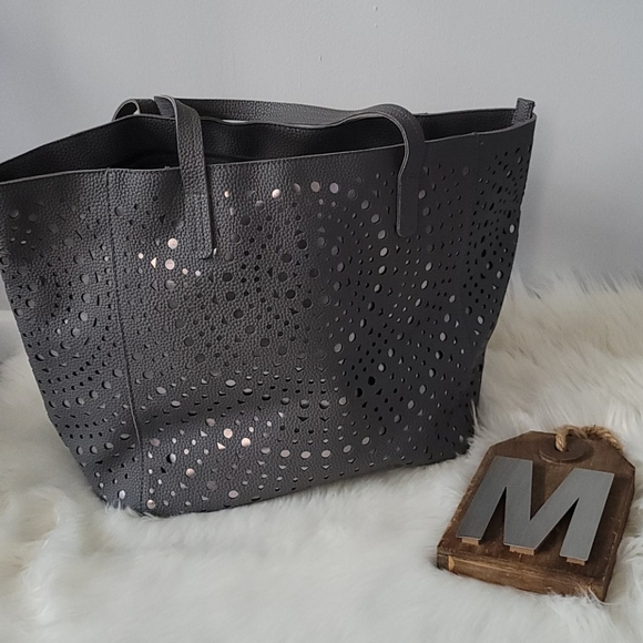 Bath & Body Works Handbags - Bath and Body Works gray laser cut tote NWT